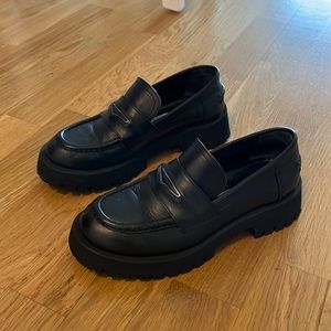 Chunky black leather loafers